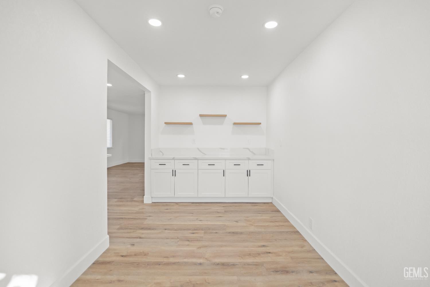 Undisclosed Address Tehachapi, CA 93561 - Photo 22 of 49 an empty room with wooden floor