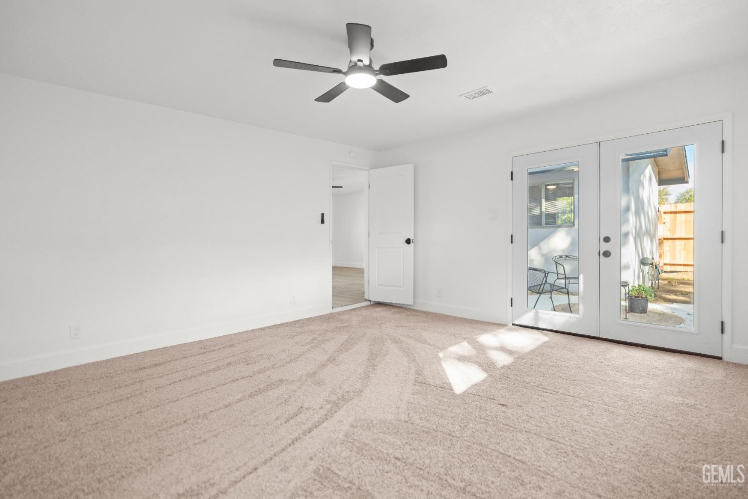 Undisclosed Address Tehachapi, CA 93561 - Photo 28 of 49 a view of a livingroom with a ceiling fan and window