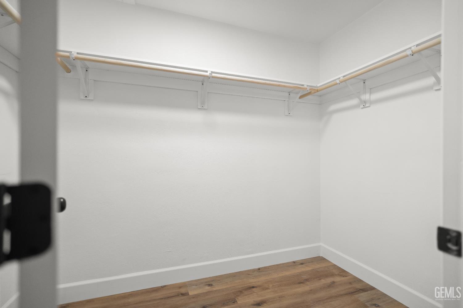 Undisclosed Address Tehachapi, CA 93561 - Photo 33 of 49 a view of an empty walk in closet