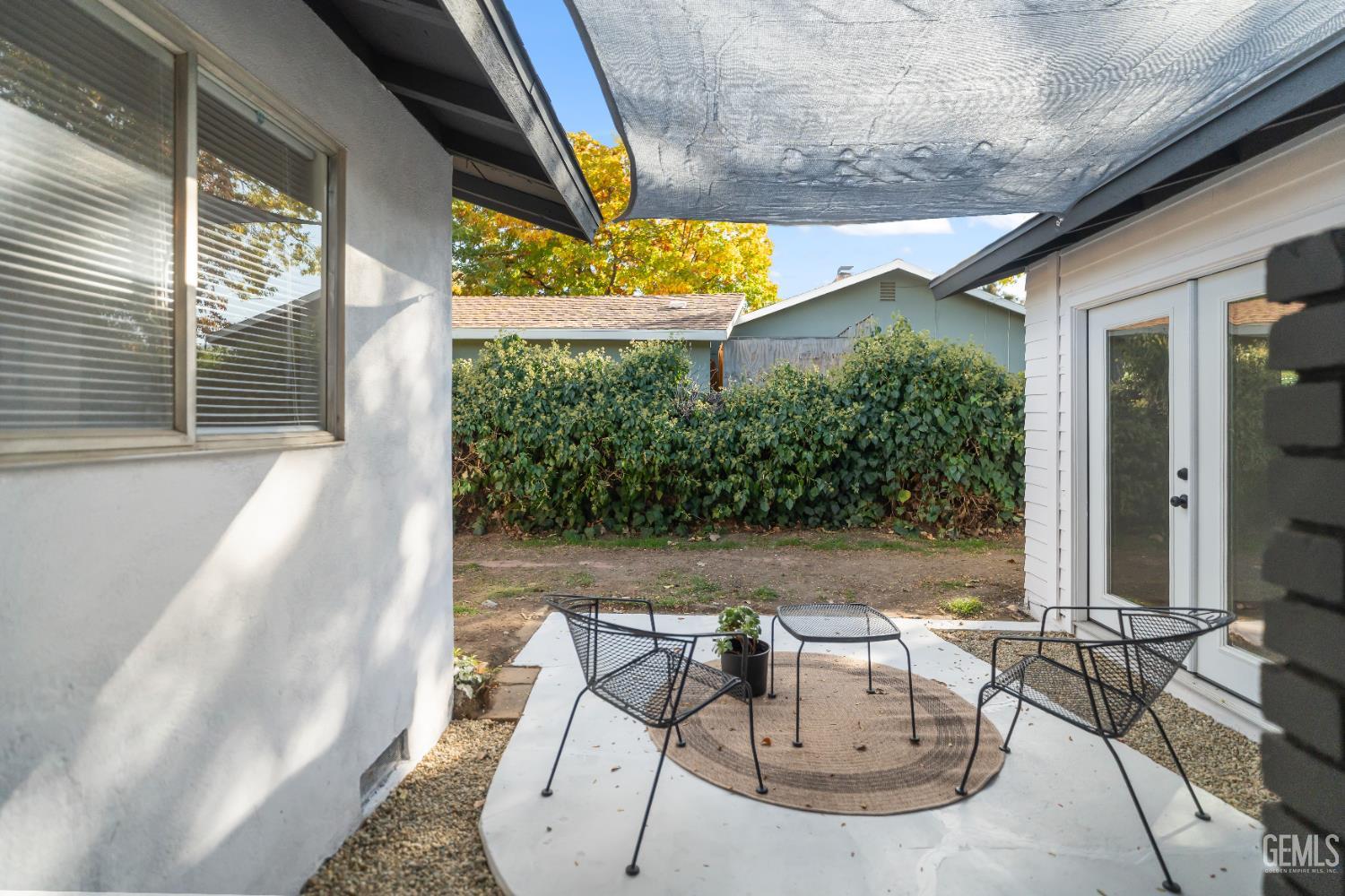 Undisclosed Address Tehachapi, CA 93561 - Photo 39 of 49 a view of a patio with table and chairs and potted plants