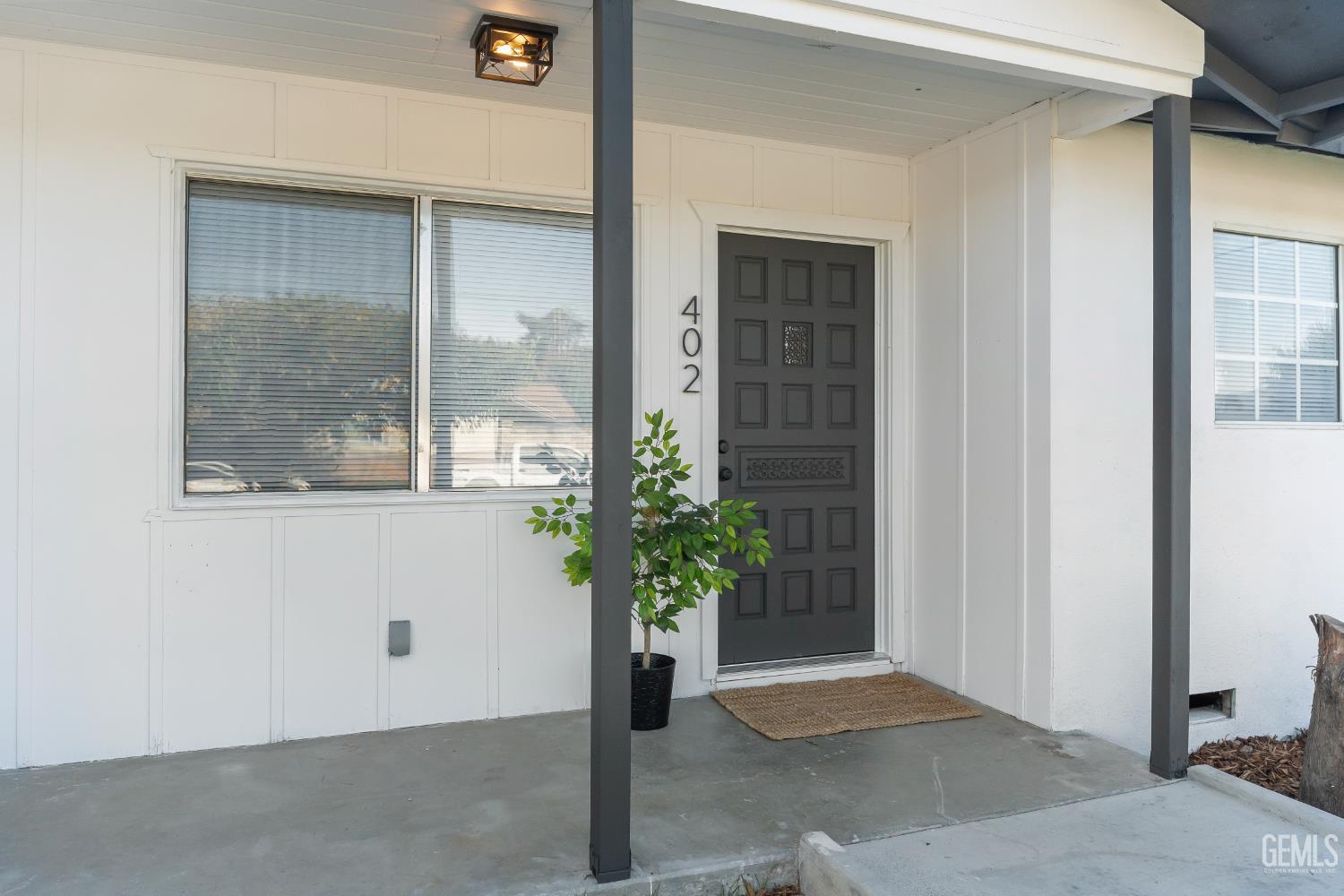 Undisclosed Address Tehachapi, CA 93561 - Photo 8 of 49 a potted plant sitting in front of a door