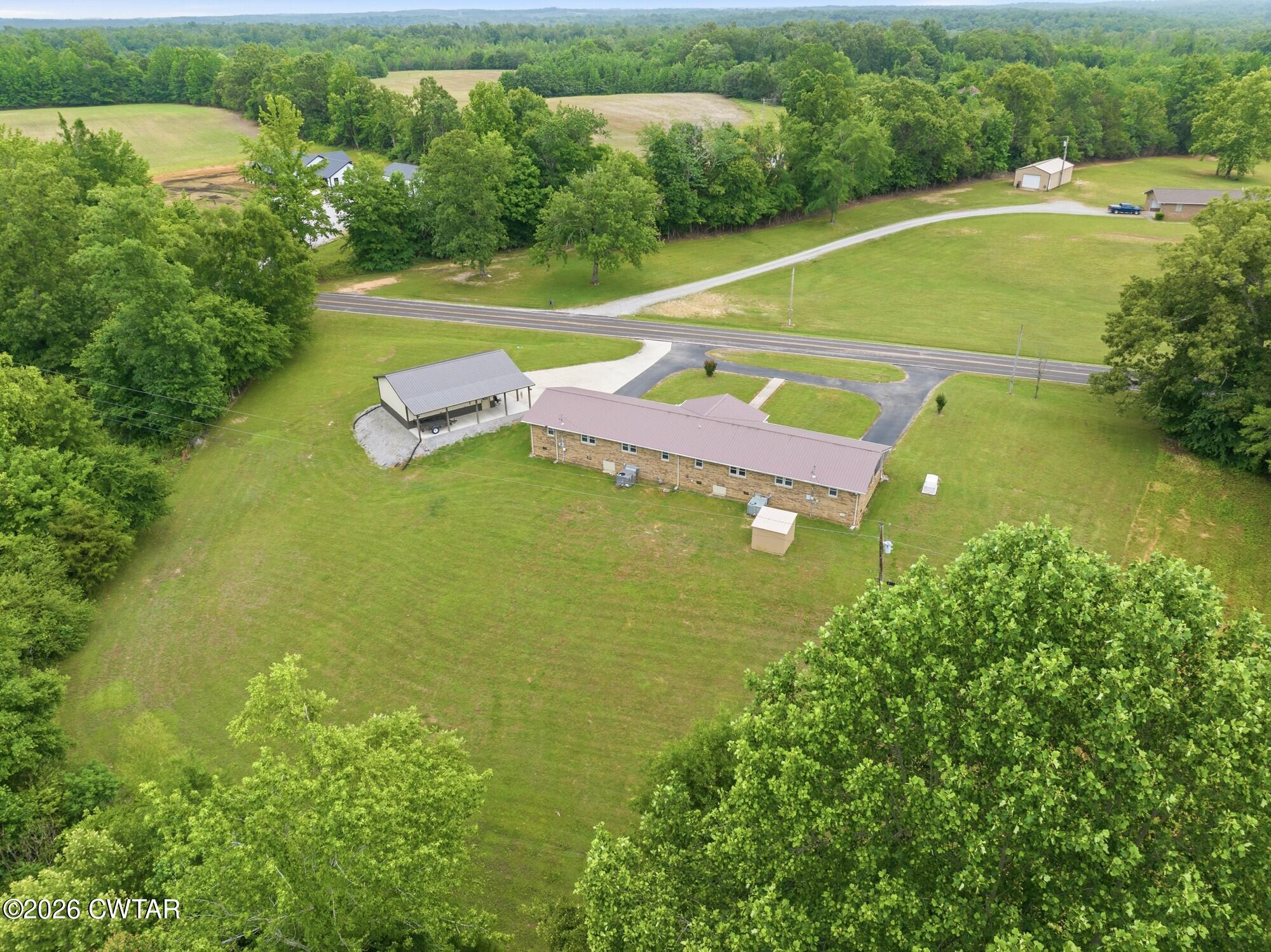 944 Brooksie Thompson Road Decaturville, TN 38329 - Photo 39 of 47 a view of a indoor basketball court