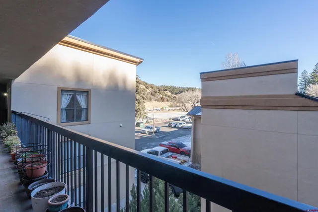 a view of a front of a house with a patio