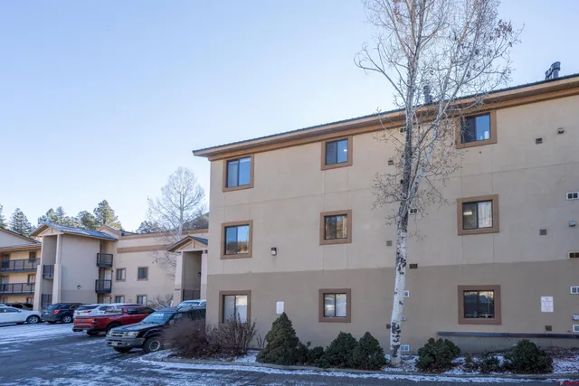 a view of a building from a balcony