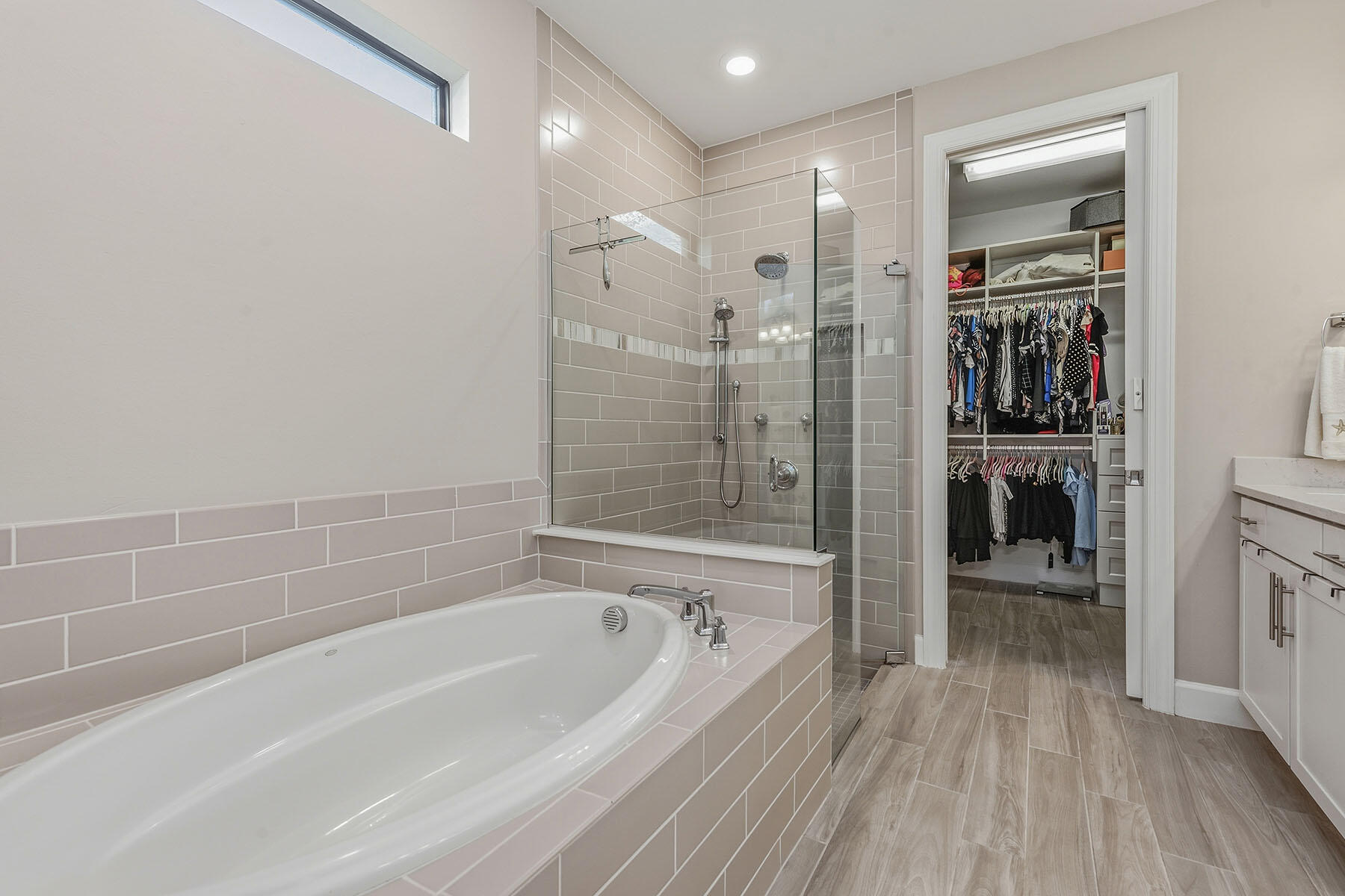 2797 Amaranda Court Naples, FL 34114 - Photo 18 of 50 a bathroom with a bathtub and a shower