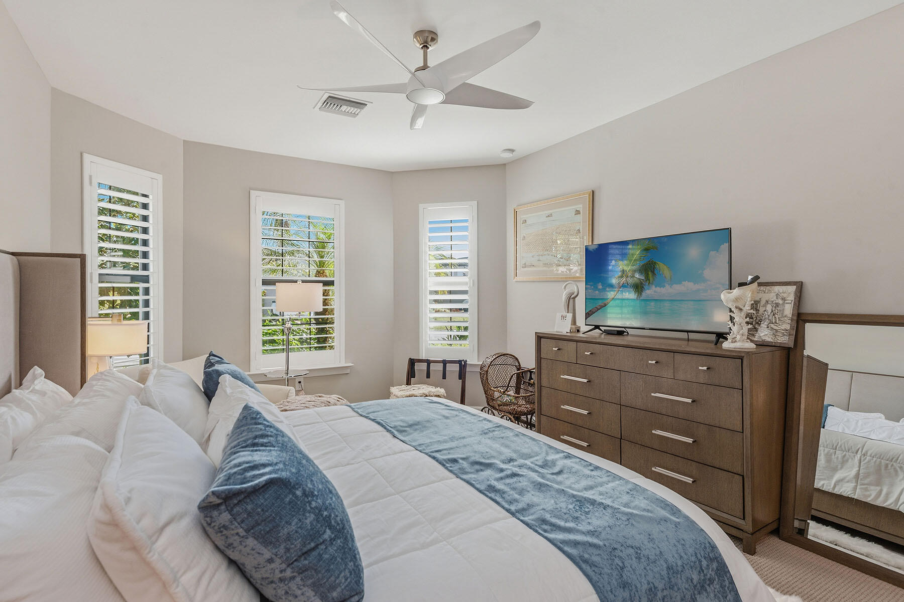 2797 Amaranda Court Naples, FL 34114 - Photo 20 of 50 a bedroom with a bed and a flat screen tv