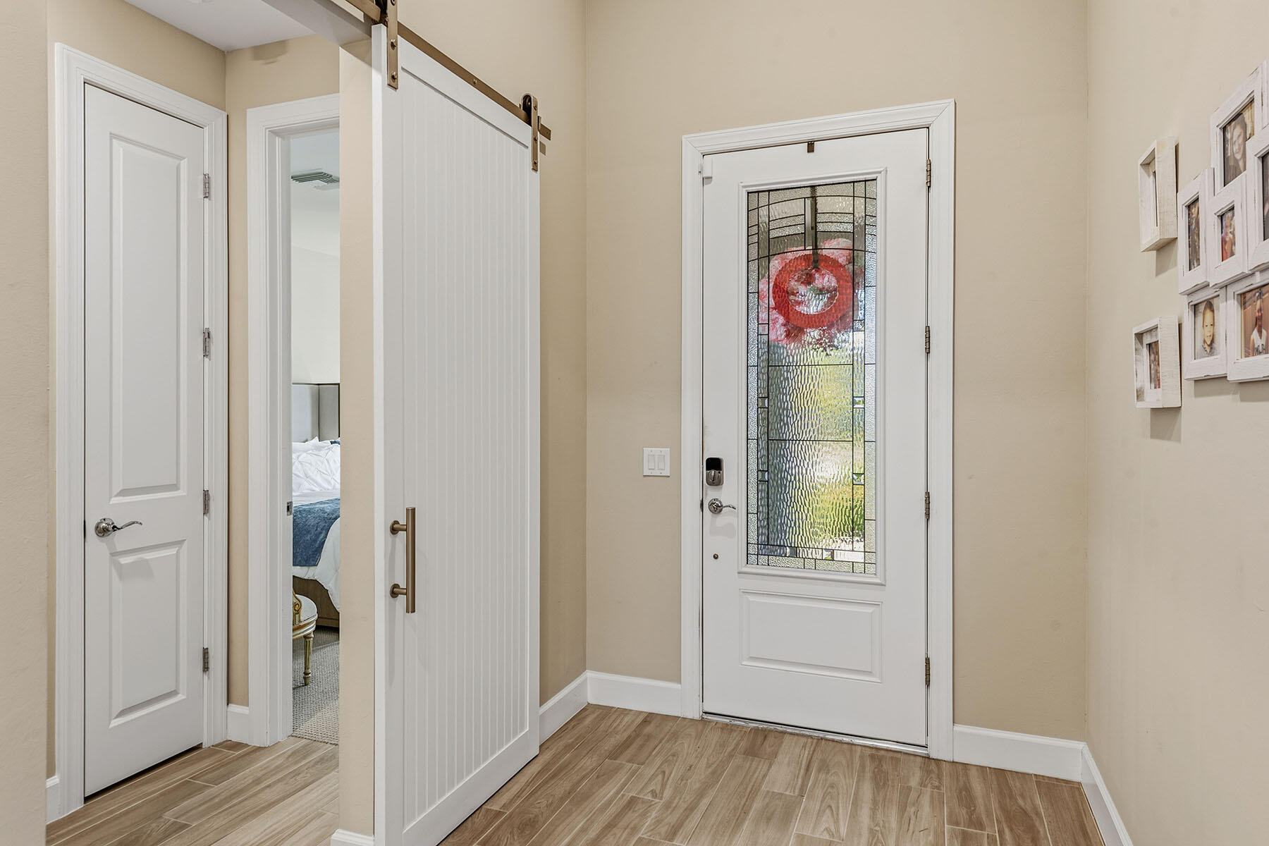 2797 Amaranda Court Naples, FL 34114 - Photo 27 of 50 a view of an entryway with wooden floor