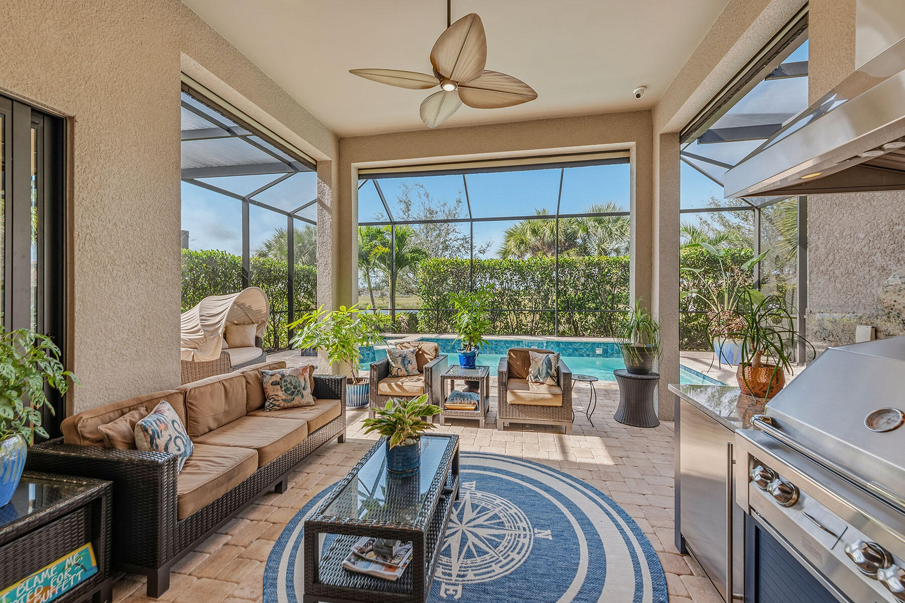 2797 Amaranda Court Naples, FL 34114 - Photo 30 of 50 a living room with furniture and a large window