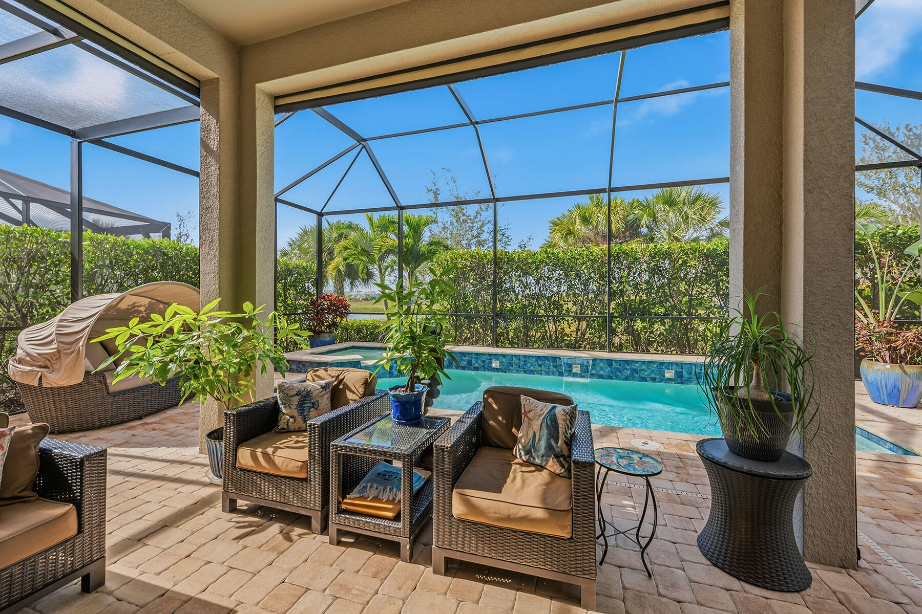 2797 Amaranda Court Naples, FL 34114 - Photo 32 of 50 a view of an outdoor sitting area with furniture and garden view