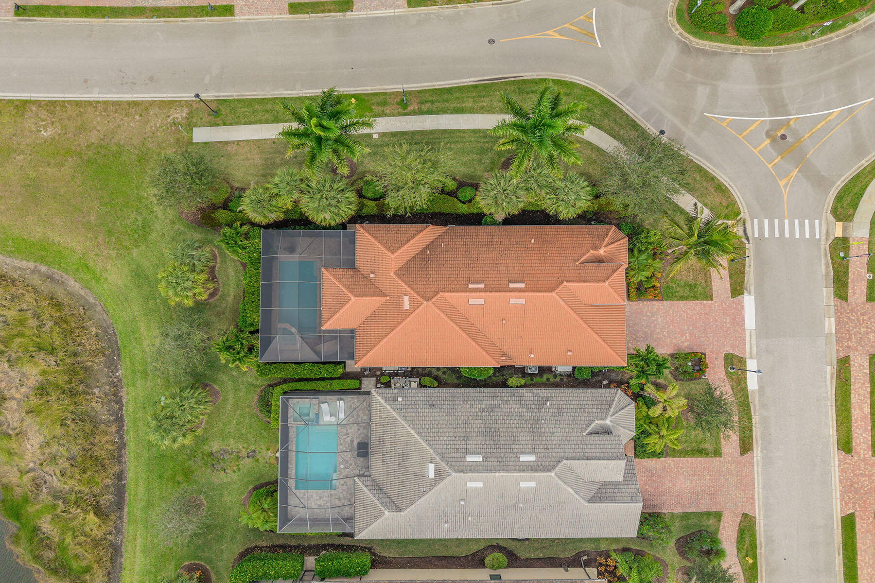 2797 Amaranda Court Naples, FL 34114 - Photo 36 of 50 an aerial view of a house with a garden and a yard