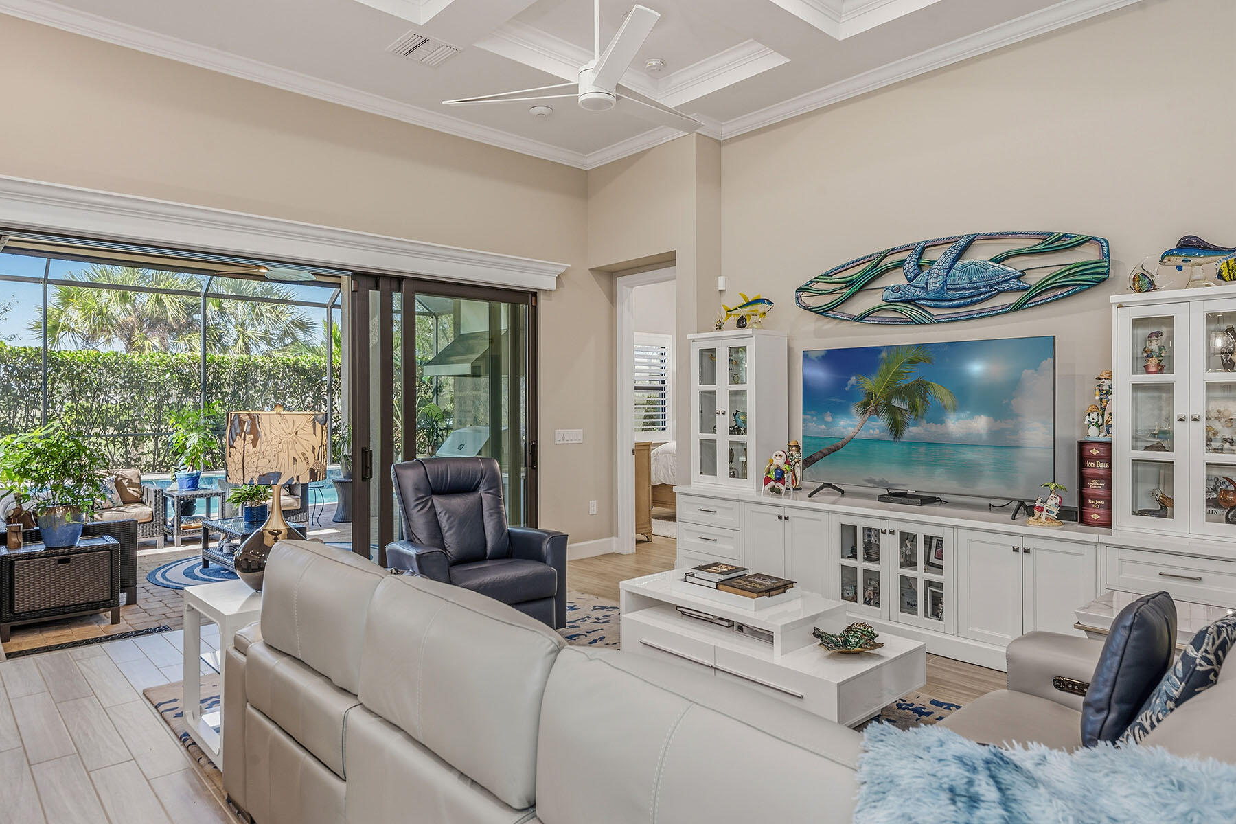 2797 Amaranda Court Naples, FL 34114 - Photo 6 of 50 a living room with furniture and a flat screen tv