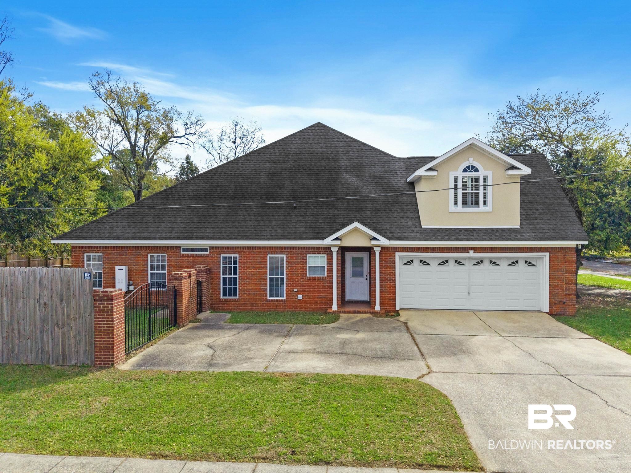 3668 Claridge Road North Mobile, AL 36608 - Photo 9 of 100 View of front of property with roof with shingles, driveway, and brick siding