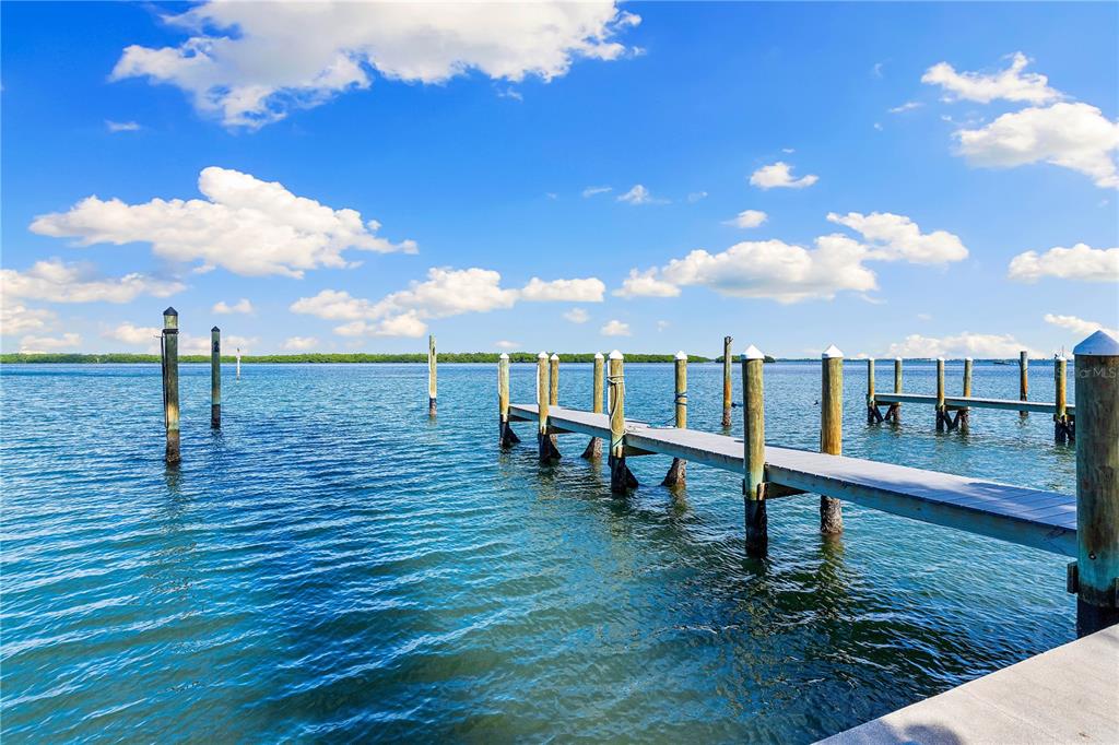 615 Dream Island Road, Unit 202 Longboat Key, FL 34228 - Photo 35 of 66 a view of a terrace with outdoor space