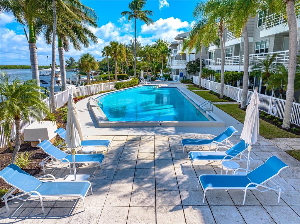615 Dream Island Road, Unit 202 Longboat Key, FL 34228 - Photo 54 of 66 a view of yard with patio