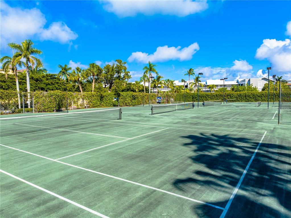 615 Dream Island Road, Unit 202 Longboat Key, FL 34228 - Photo 58 of 66 a view of a tennis ground