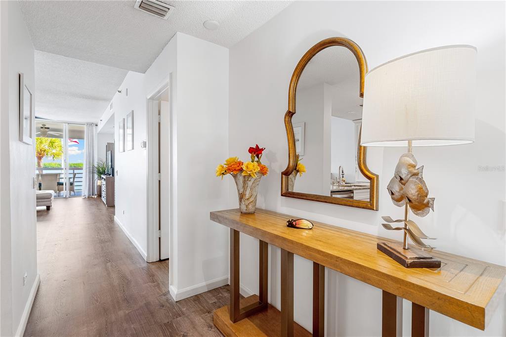 615 Dream Island Road, Unit 202 Longboat Key, FL 34228 - Photo 6 of 66 a view of lobby with furniture and wooden floor