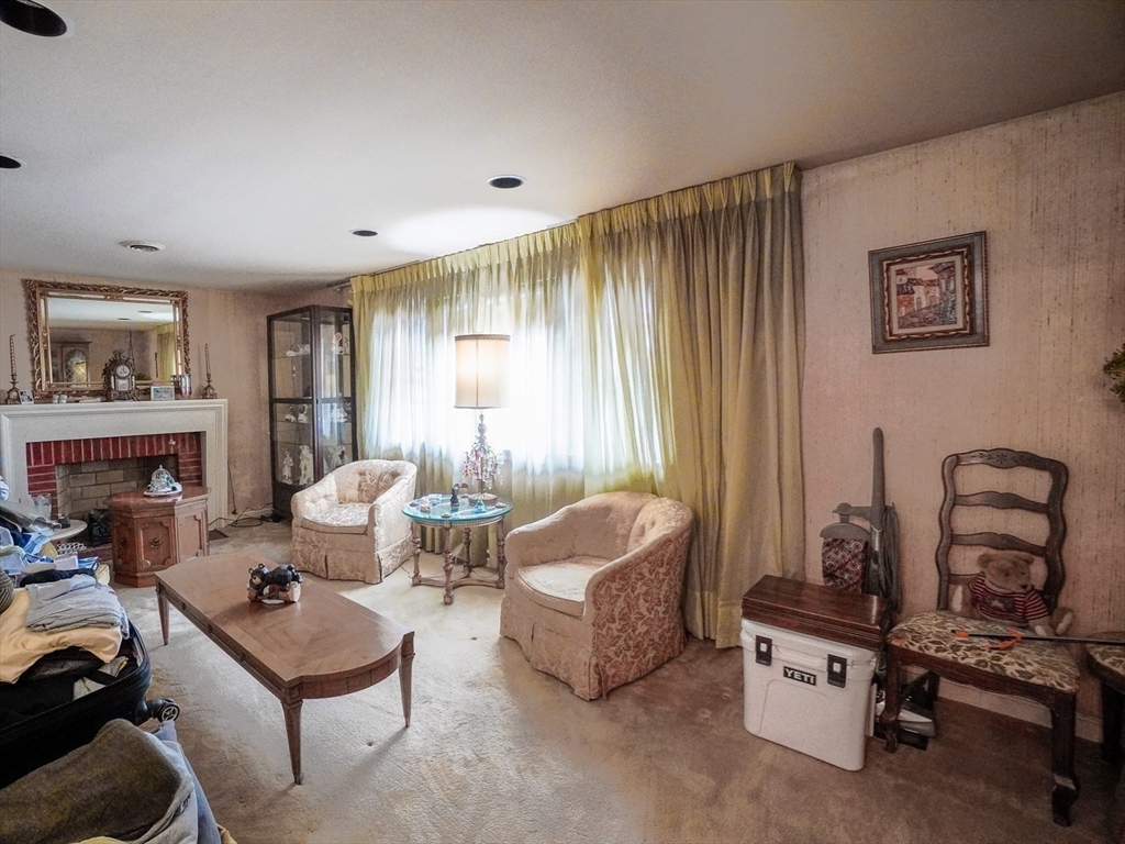 53 Yale Road Needham, MA 02494 - Photo 7 of 21 a living room with furniture and a window