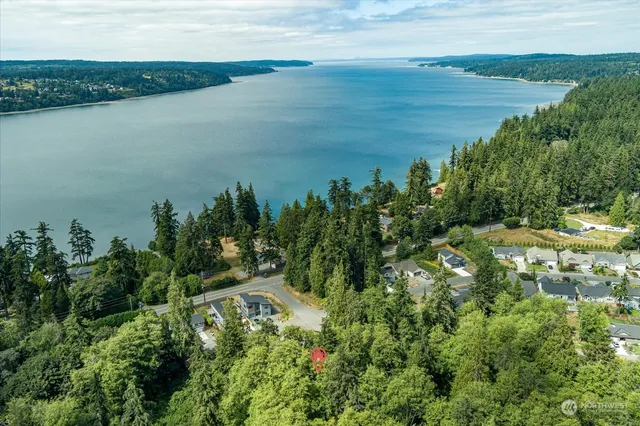 a view of a lake with a yard
