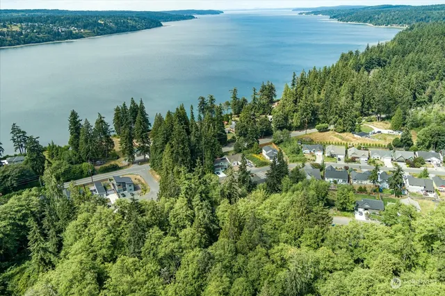 a view of a lake with a yard