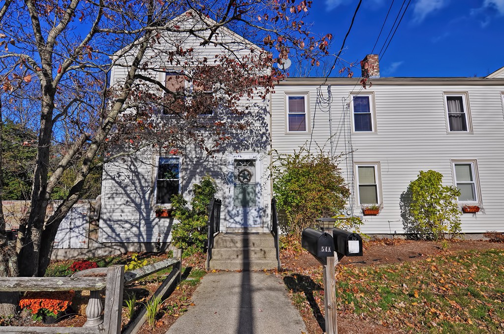 54 Main Street, Unit A Foxboro, MA 02035 - Photo 1 of 21 a view of a house with a yard