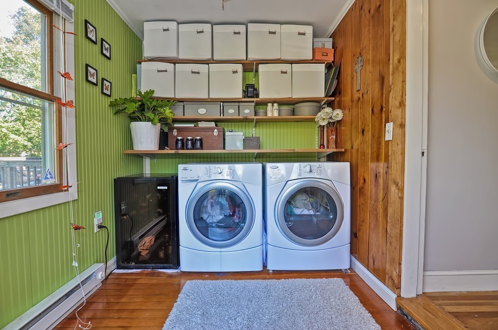 54 Main Street, Unit A Foxboro, MA 02035 - Photo 16 of 21 a utility room with dryer and washer