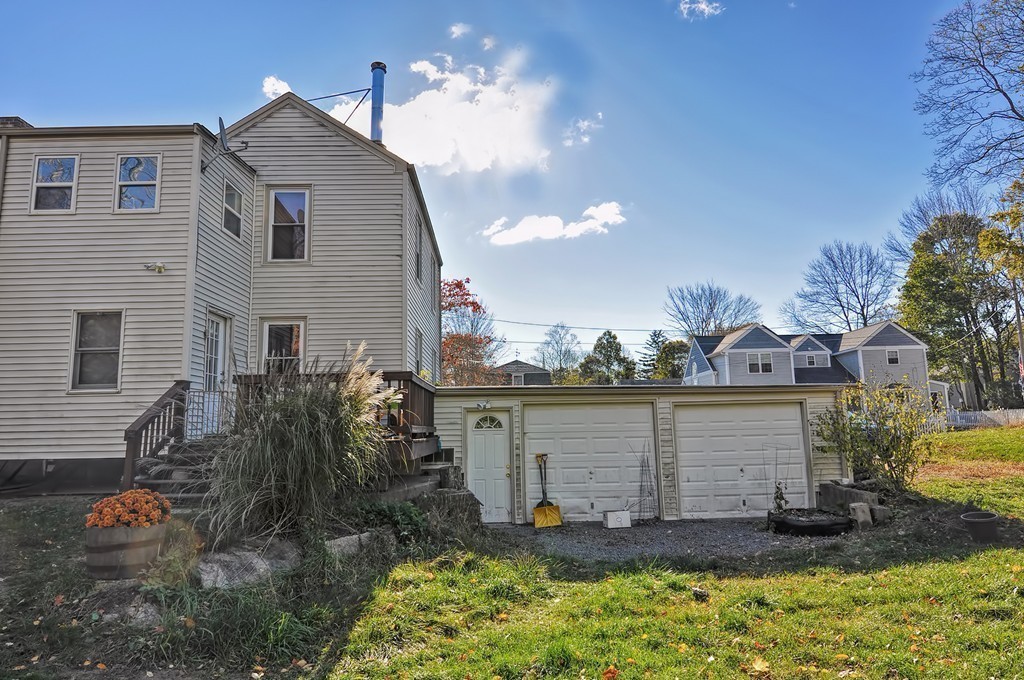 54 Main Street, Unit A Foxboro, MA 02035 - Photo 19 of 21 a view of a house with a yard