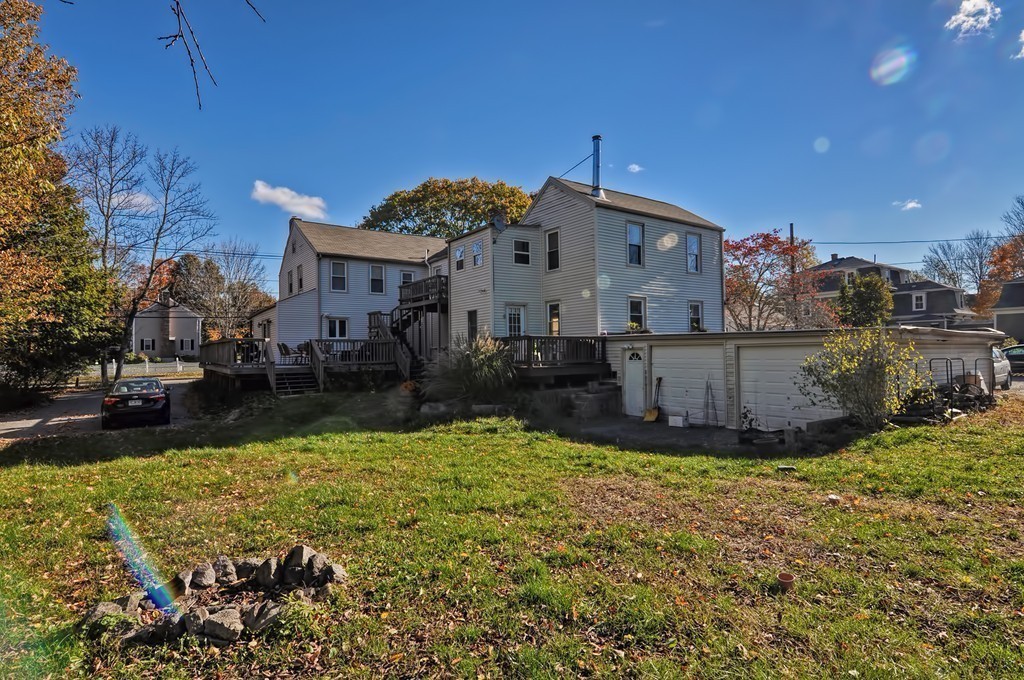 54 Main Street, Unit A Foxboro, MA 02035 - Photo 20 of 21 a view of a house with a yard