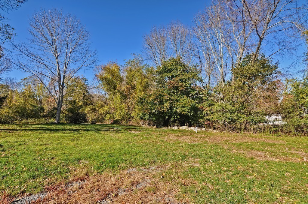 54 Main Street, Unit A Foxboro, MA 02035 - Photo 21 of 21 a view of lawn chairs and yard