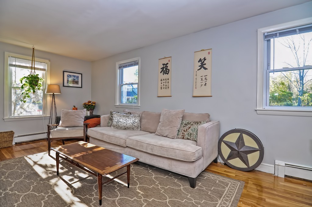 54 Main Street, Unit A Foxboro, MA 02035 - Photo 6 of 21 a living room with furniture and a window