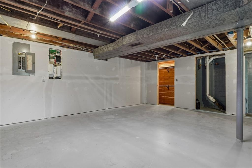 809 Franklin Road Mars, PA 16046 - Photo 29 of 44 Lower-level flex/rec space with cedar closet, furnace area and walk-out access