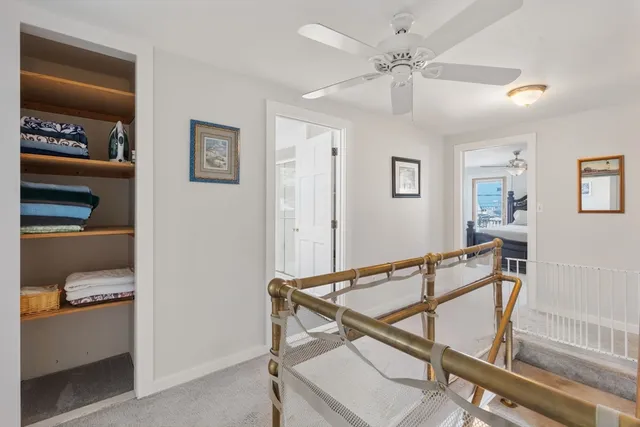 a view of a hallway with workspace