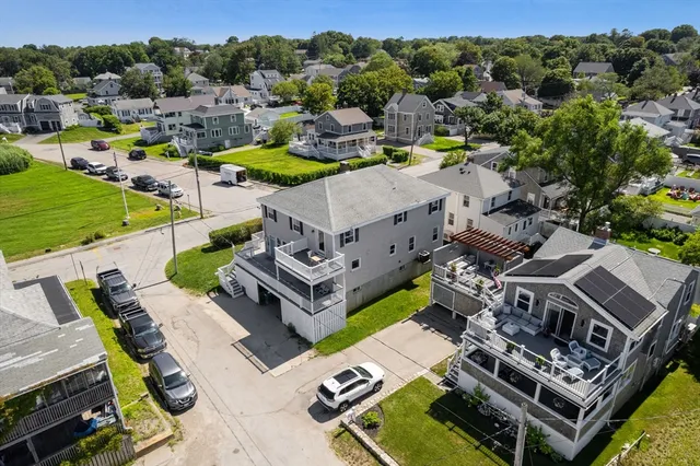 an aerial view of a house with a garden