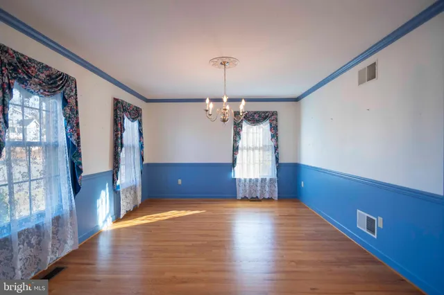a bathroom with a sink a large mirror and a shower