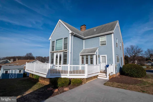a view of an empty room with a fireplace