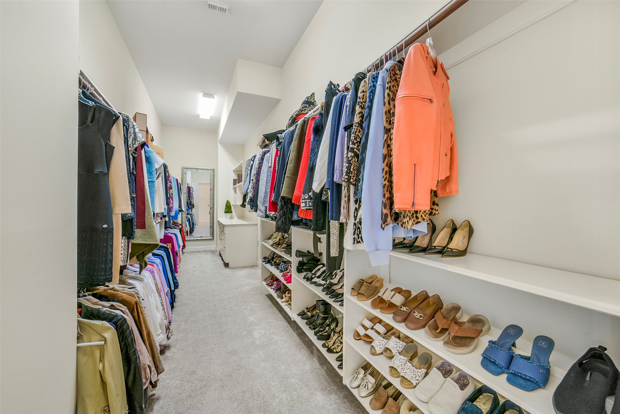 17302 Atherington Place Spring, TX 77379 - Photo 28 of 50 Exceptional custom closet design offering abundant storage and organization.