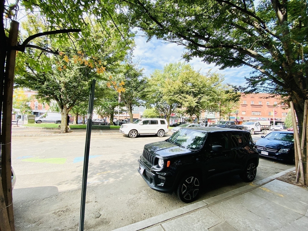 35 Cherry Street, Unit 1 Chelsea, MA 02150 - Photo 11 of 14 a view of a car parked on the side of a street