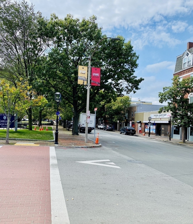 35 Cherry Street, Unit 1 Chelsea, MA 02150 - Photo 13 of 14 a view of a street with houses on both side