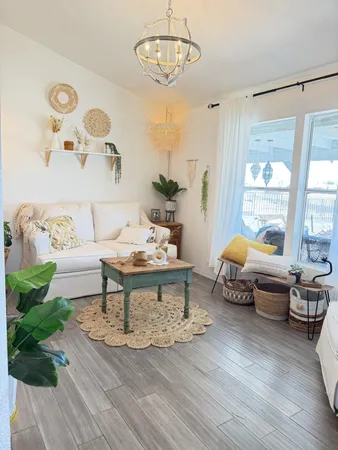 a living room with furniture and a table