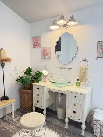 a view of a hallway view with wooden floor and staircase