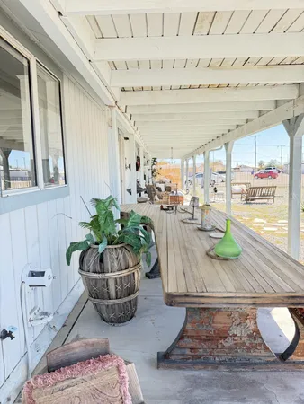a view of a balcony with chairs