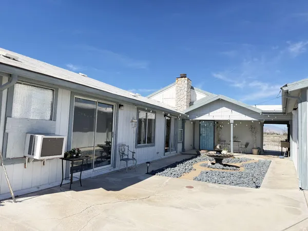 a view of a house with a patio