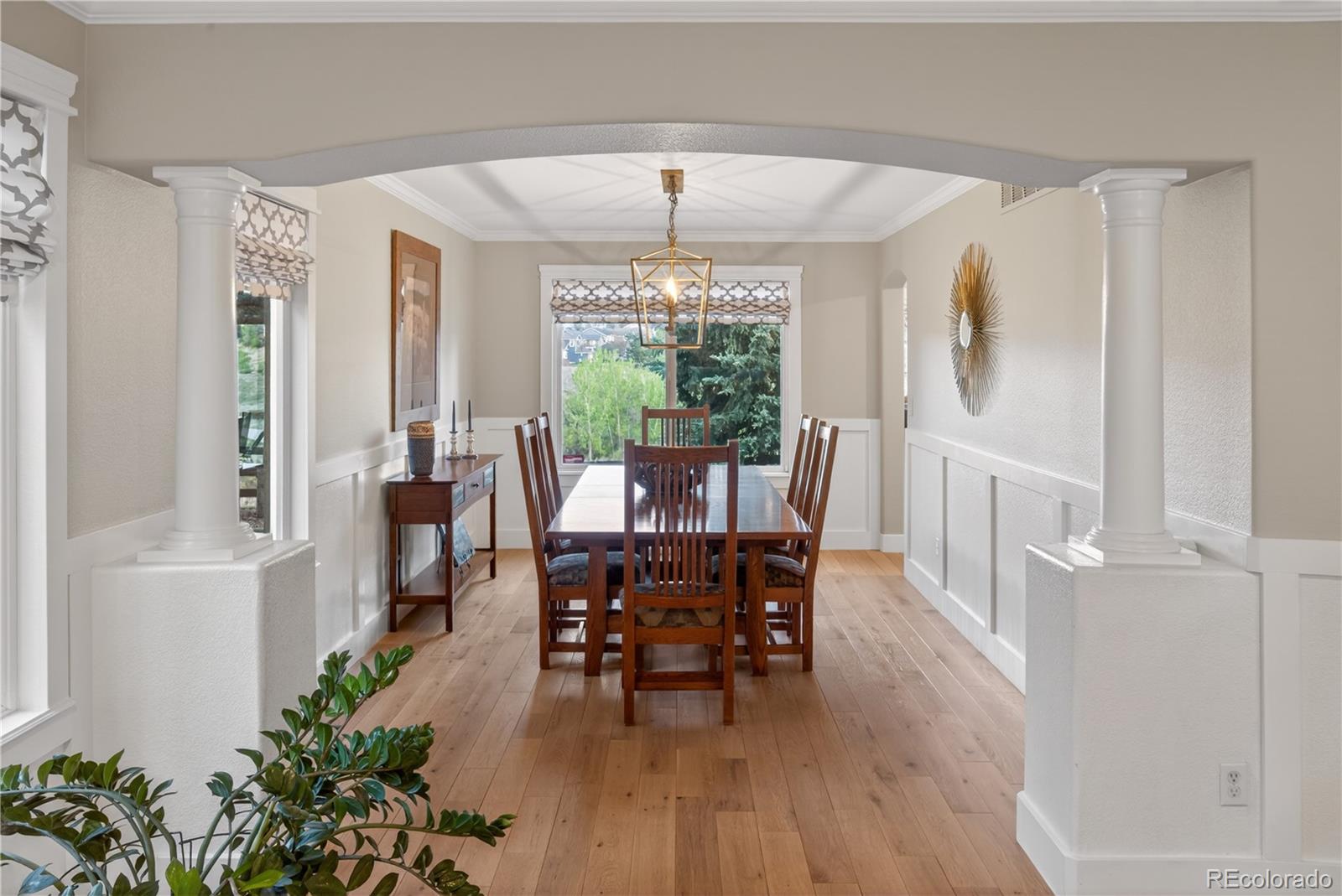 3041 Wyecliff Way Highlands Ranch, CO 80126 - Photo 17 of 50 a dining room with furniture window and wooden floor
