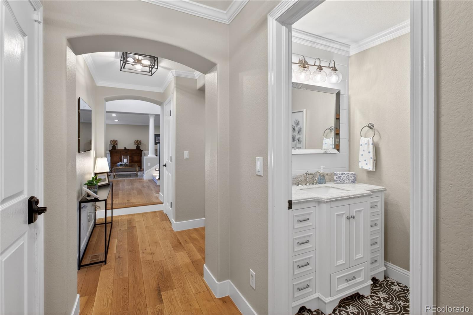 3041 Wyecliff Way Highlands Ranch, CO 80126 - Photo 20 of 50 a view of a bathroom from the hallway
