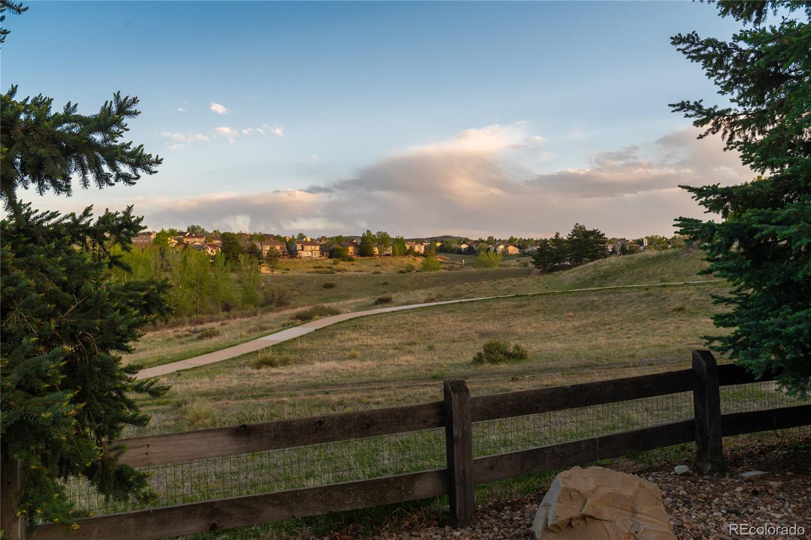 3041 Wyecliff Way Highlands Ranch, CO 80126 - Photo 47 of 50 a view of a terrace with lake view and mountain view