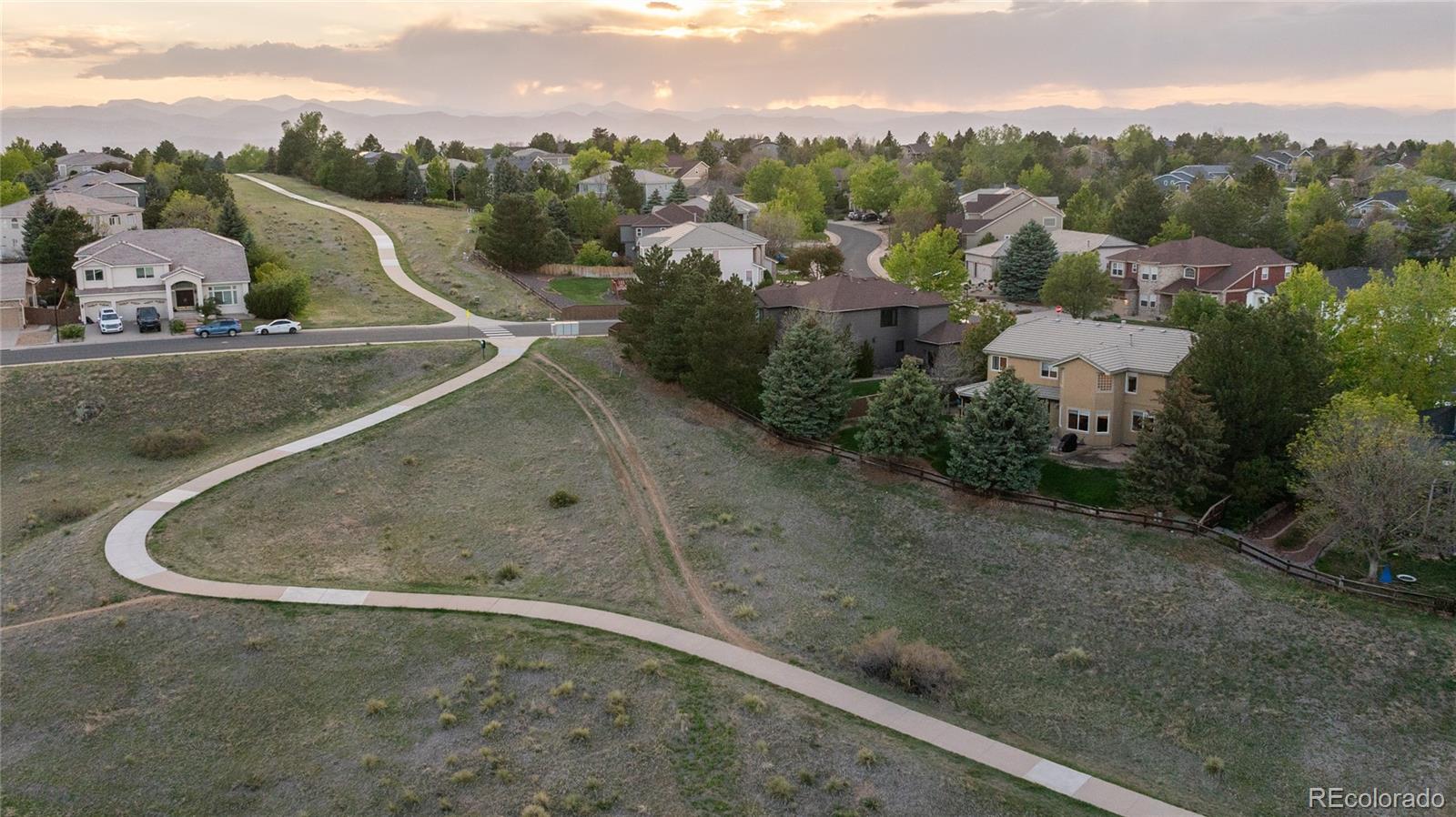 3041 Wyecliff Way Highlands Ranch, CO 80126 - Photo 50 of 50 an aerial view of a house with a yard