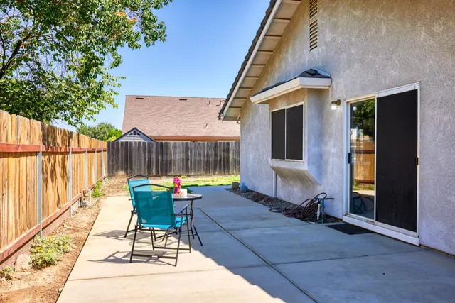a view of a backyard with a garden