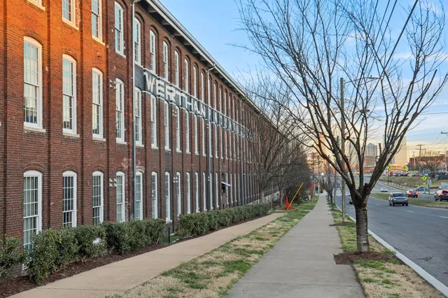 a front view of a building with pathway