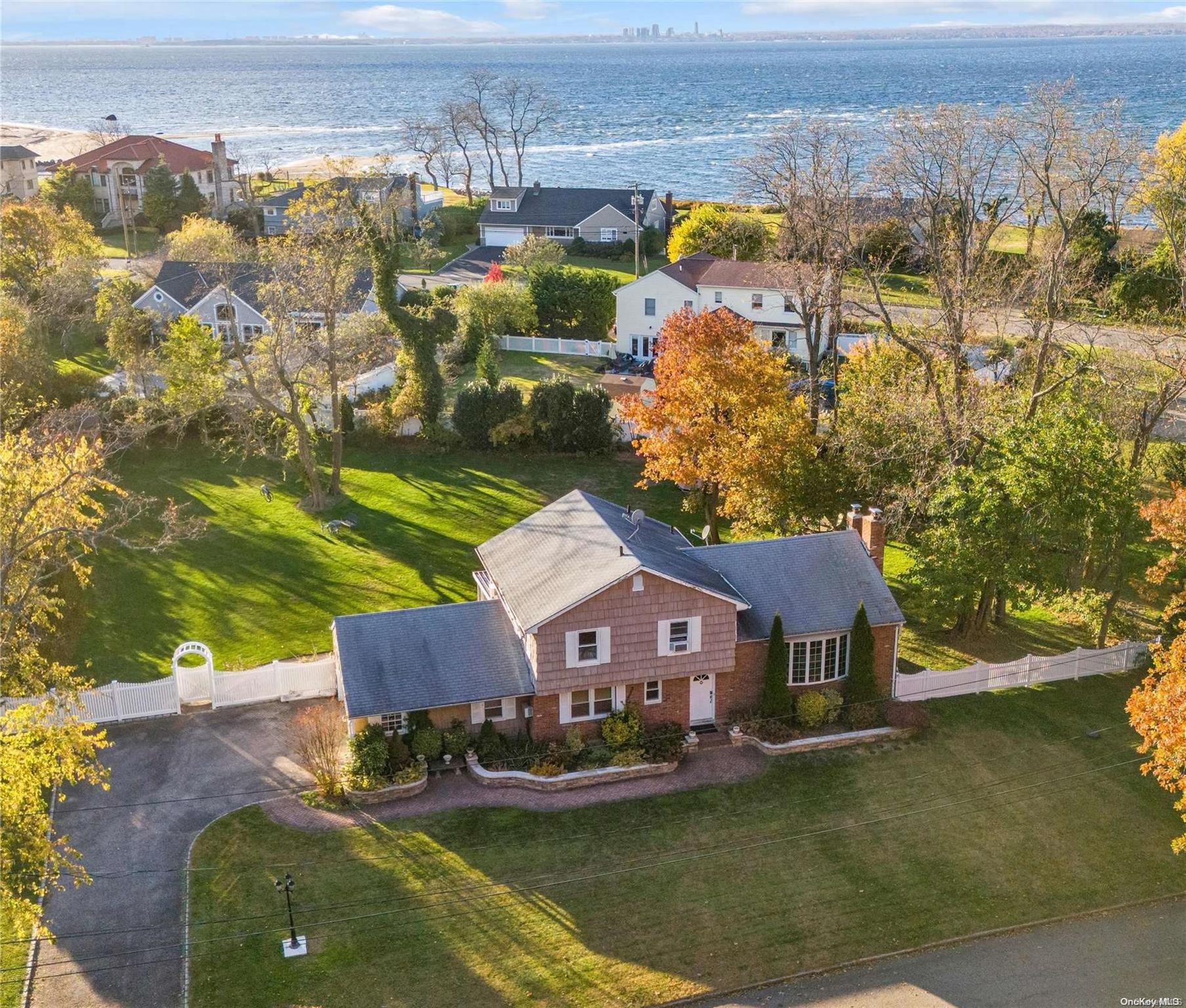 a aerial view of a house with a ocean view