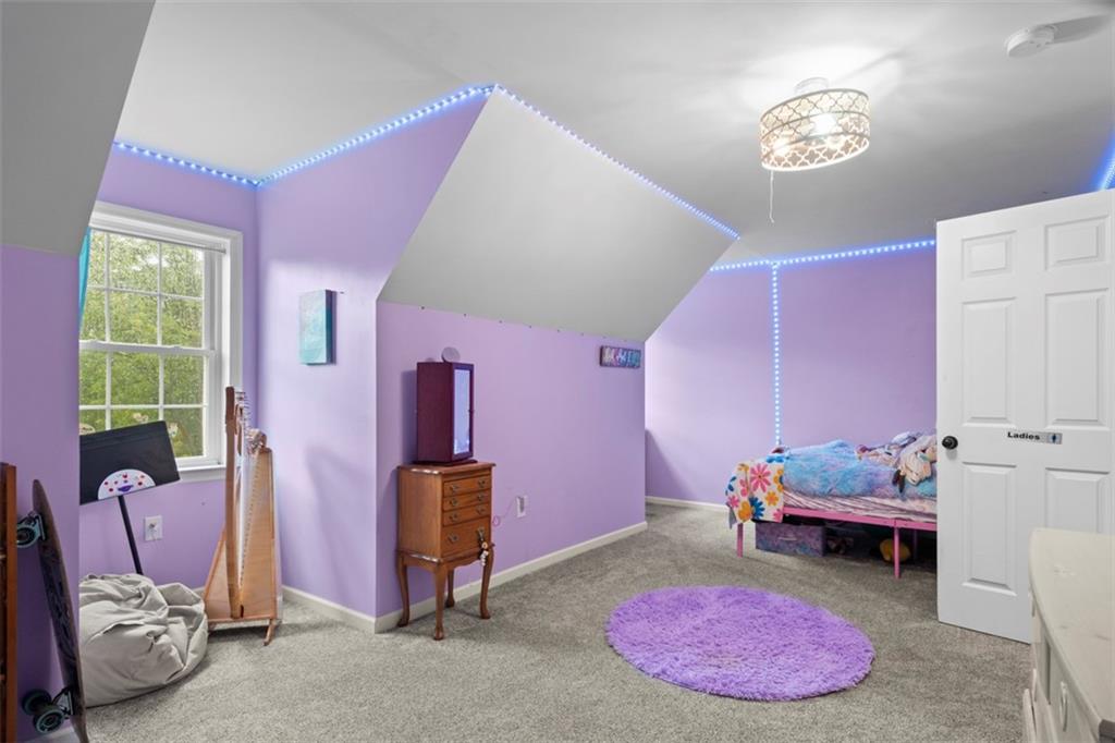 105 Jacobs Road Harrisville, PA 16038 - Photo 11 of 38 a bedroom with furniture and a window