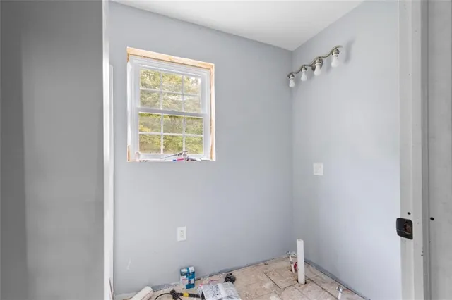 a view of a bedroom with a window